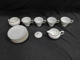 Bundle of 7 Wedgwood Bone China Plates w/ 4 Matching Tea Cups, Cream and Sugar Dish