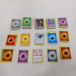 Bundle of Assorted Pokemon Cards In Tin alternative image
