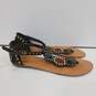 Womens Black Buckle Studded Open Toe Flat Ankle Strap Thong Sandals Size 8.5 image number 2
