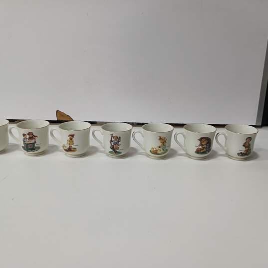 Set Of 23 MJ Hummel Merry Wanderer Multicolor Tea Cups And Saucers image number 3