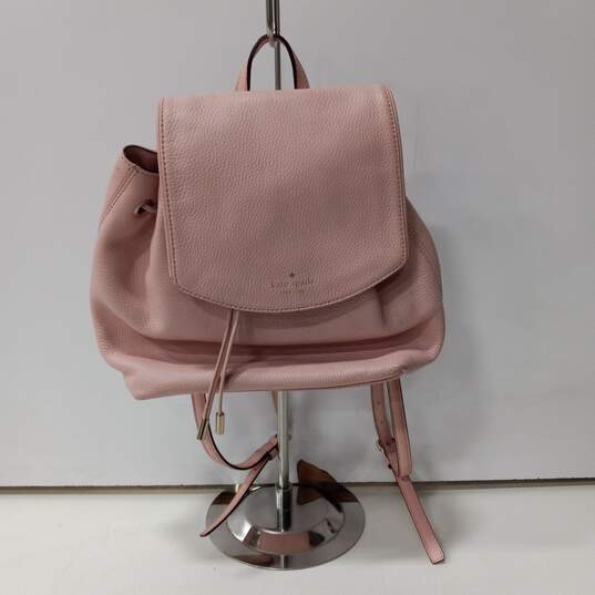 Kate Spade Rose Pink Pebbled Leather Drawstring Flap Backpack image number 1