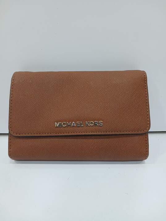 Michael Kors Brown Faux Leather Clutch/Wallet image number 1