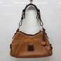 Vintage Dooney & Bourke Brown Pebbled Leather Shoulder Bag image number 1