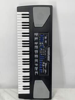 Techno-Beat  Built-In Speaker Electronic Keyboard Powers On E-0502901-A
