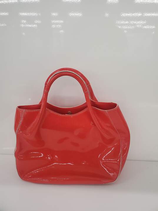 KATE SPADE ♠️ Pretty Penny Red padded leather hand bag Used image number 2