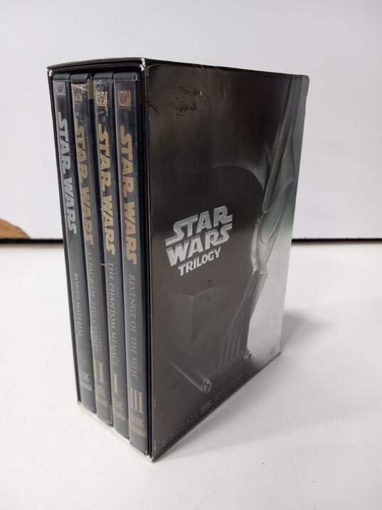 2 Star Wars Trilogy DVD Box Sets Gold & Black image number 4