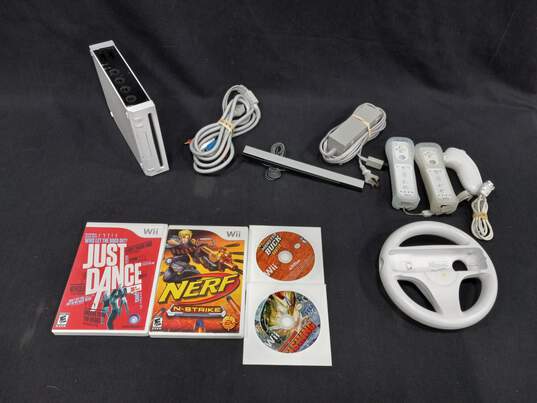Nintendo Wii Console with Four Games & Two Controllers image number 1