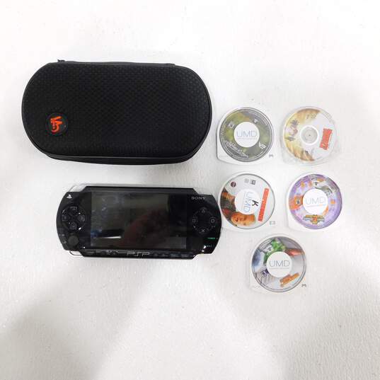 Sony PlayStation Portable + Case W/ 5 Discs Cheaper By The Dozen image number 1
