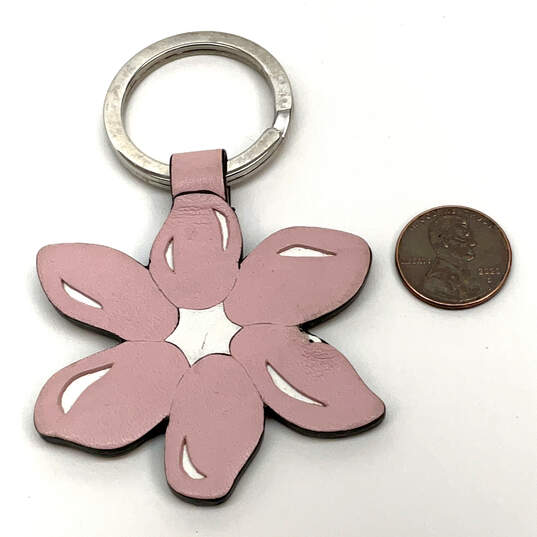 Buy the Designer Coach Silver-Tone Leather Fob Pink White Flower Keychain