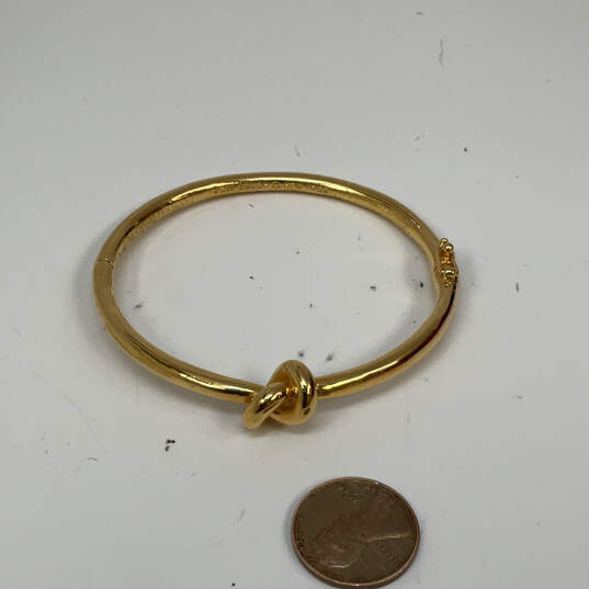 Designer Kate Spade Gold-Tone Sailors Knot Hinged Classic Bangle Bracelet image number 2