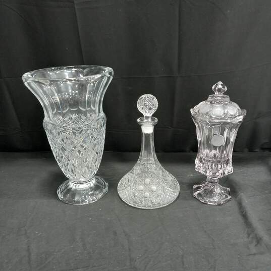 Bundle of 3 Large Crystal Dishes - Vase, Decanter, And Candy Jar With 2 Lids image number 1