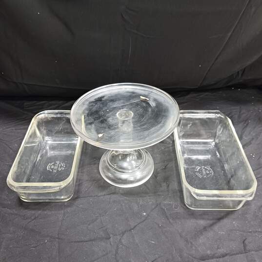 2 Pyrex Glass Loafs and One Glass Cake Stand image number 1