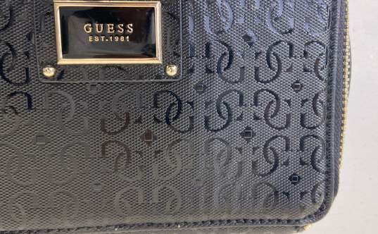 GUESS Black Logo Print Signature Zip Around Crossbody Bag image number 7