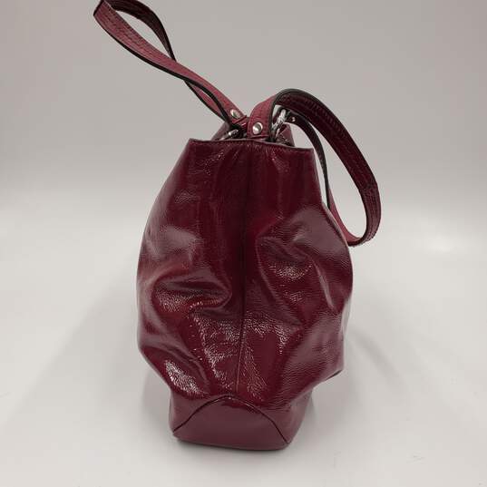 Buy the Coach Soho Shoulder Bag Purse Plum Red Patent Leather