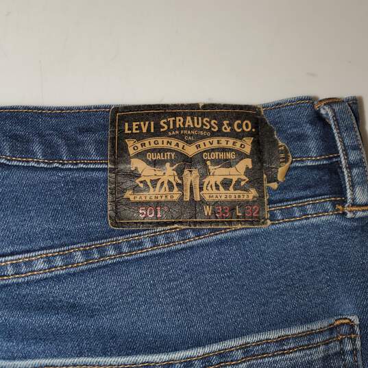 Levi's 501 Blue 5 Button Up Jeans W/Red Lined Pockets Size 33Wx32L image number 4