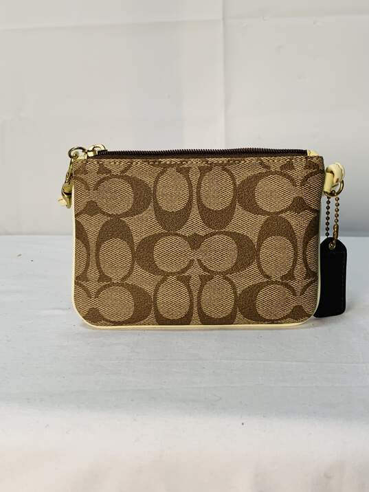 Coach Small Tan/White Wristlet Certified Authentic image number 1
