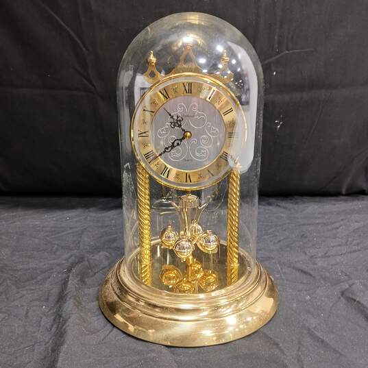 Vintage Dunhaven Quarts Dome Clock with Rotating Pendulum image number 1