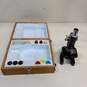 Tasco Delux Microscope in Wooden Box image number 1