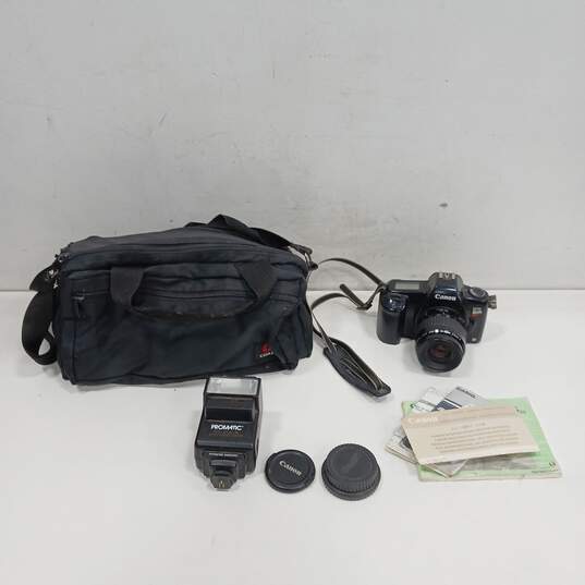 Canon EOS Rebel II Camera and Promatic Auto Focus Flash in Coast Soft Shoulder Carry Bag image number 1