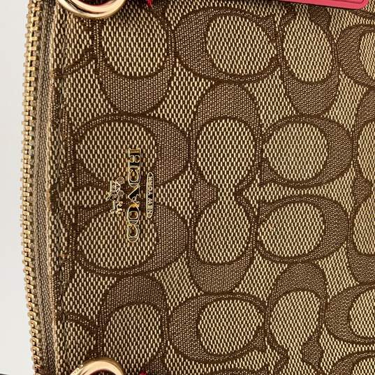 Womens Brown Pink Signature Print Bag Charm Crossbody Strap Satchel Handbag image number 5