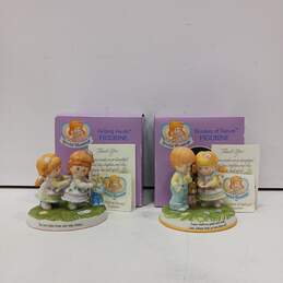 Pair of Figurines Helping Hands & Wonder Of Nature In Box