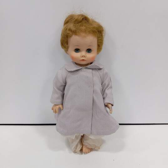 MME Alexander Blonde In Patterned Coat Baby Doll image number 1