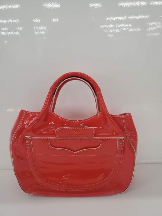 KATE SPADE ♠️ Pretty Penny Red padded leather hand bag Used image number 1