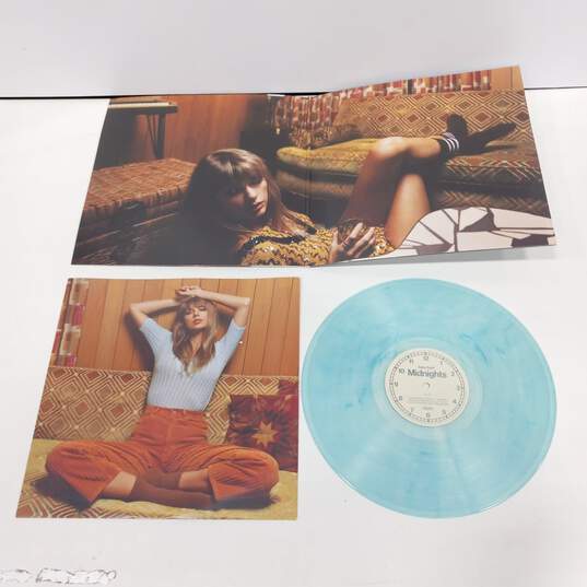 Pair of Taylor Swift Moonstones Midnight Blue Edition Vinyl Records image number 4