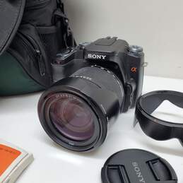 Sony DSLR A100 Digital Camera with DT 18-200mm F/3.5-6.3 Lens Battery Charger Bag & Manual alternative image