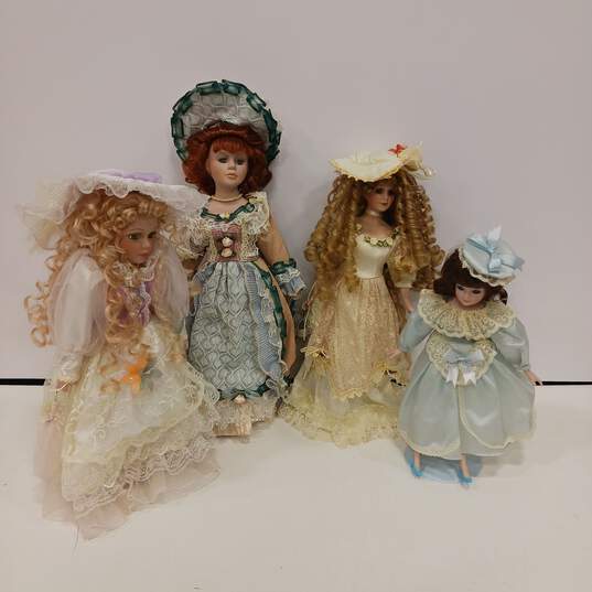 4pc. Bundle of Assorted Collectible Porcelain Dolls image number 1