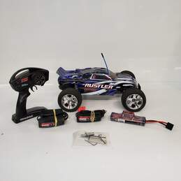 Traxxas Rustler 4x4 RC Car w/ 2 Chargers, Tools, Battery, and Body
