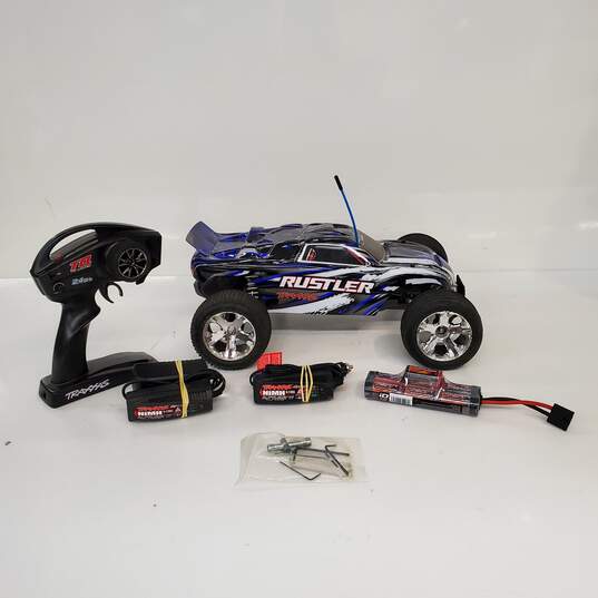 Traxxas Rustler 4x4 RC Car w/ 2 Chargers, Tools, Battery, and Body image number 1
