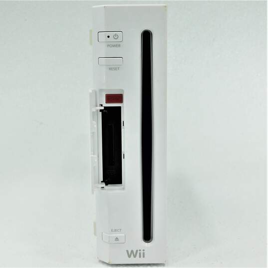 Nintendo Wii With 2 Games, 3 Controllers, 2 Nunchucks, and 1 Stand Including Just Dance 2017 image number 2