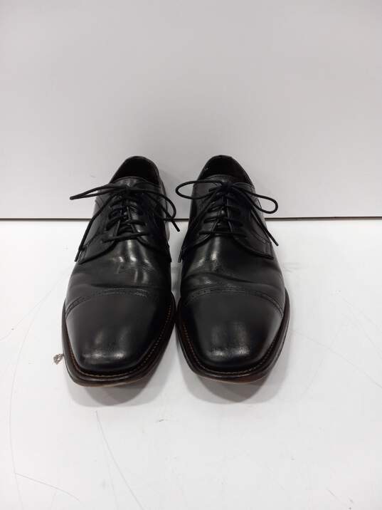 Johnston & Murphy Men's Black Leather Dress shoes Size 9.5 image number 1
