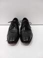 Johnston & Murphy Men's Black Leather Dress shoes Size 9.5 image number 1