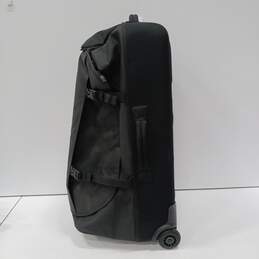 Oakley Black Suitcase on Wheels with Backpack