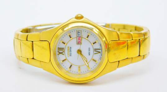 Citizen Eco-Drive Movement E000 WR 100 Gold Tone Stainless Steel Watch Day Date 56.1g image number 2