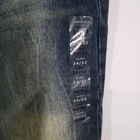 NWT Mens Regular Fit Medium Wash Denim Faded Skinny Leg Jeans Size 34/32 image number 4