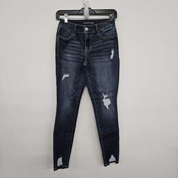 Distressed Dark Denim Skinny Jeans