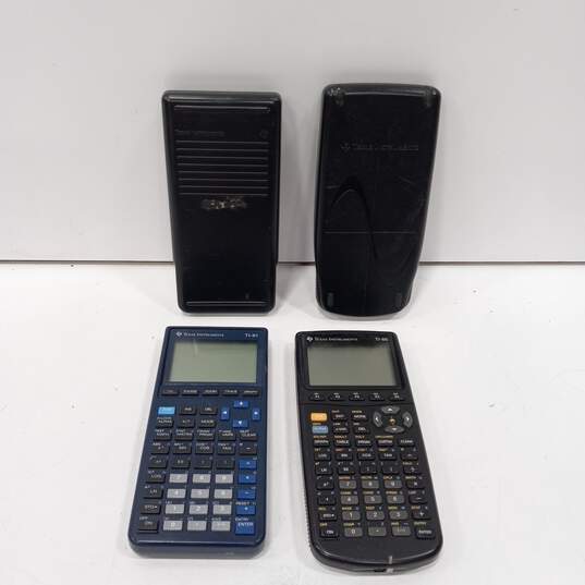 Lot of 4 Assorted Texas Instruments Graphing Calculators image number 1