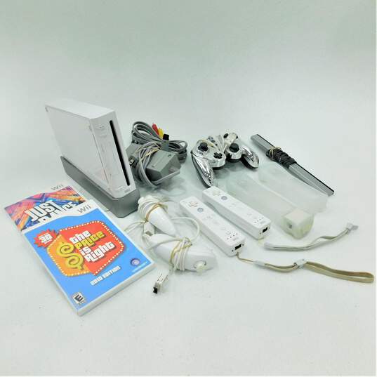 Nintendo Wii With 2 Games, 3 Controllers, 2 Nunchucks, and 1 Stand Including Just Dance 2017 image number 1