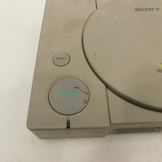 Sony PlayStation w/4 Games and 2 controllers image number 7