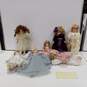 Bundle of 7 Assorted Porcelain Dolls image number 1