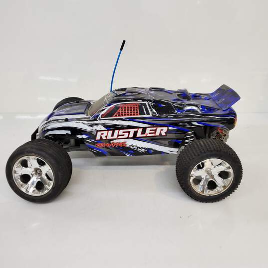 Traxxas Rustler 4x4 RC Car w/ 2 Chargers, Tools, Battery, and Body image number 3