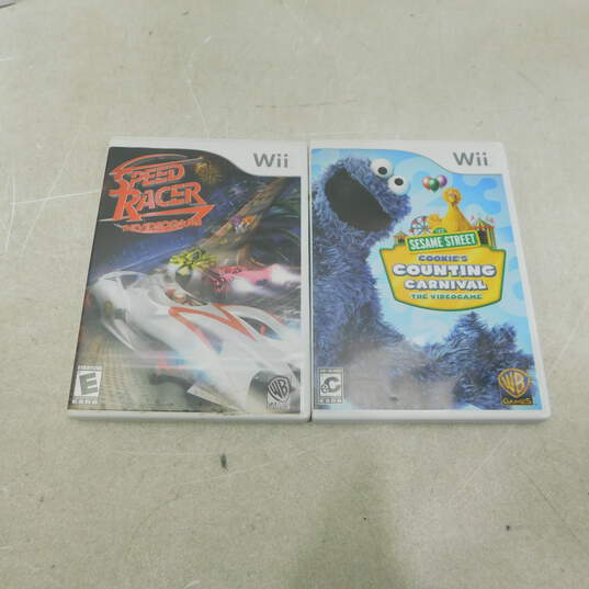 Nintendo Wii w/ 2 Controllers, 2 nunchucks, 2 Games image number 8