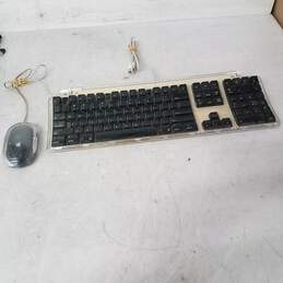 Apple Macintosh M7803 Pro Keyboard, Black/Clear Full-Size with M5769 wired Pro Mouse - Untested