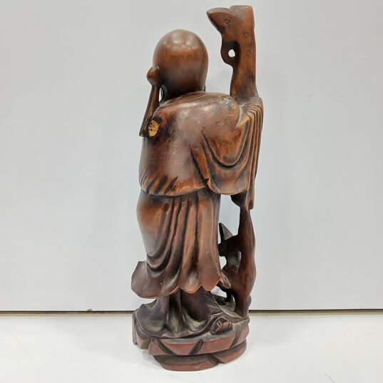Hand-Carved Wooden Figurine image number 2