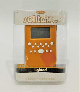 Radica Solitaire 2 in 1 Electronic Handheld Card Game NIB