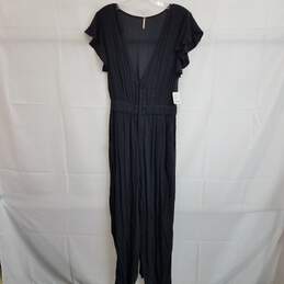 Free People black v neck relaxed fit short sleeve jumpsuit XS