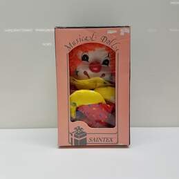 Musical Doll -It's a small world- Wind up,Head Rotates *Long Description